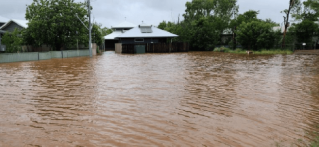 ‘Once in a century’ flood cuts off communities in Australia