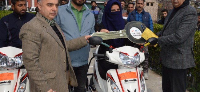 Div Com distributes motorized tricycles to physically challenged persons Div Com distributes motorized tricycles to physically challenged persons