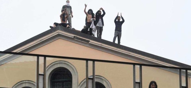 Prisoners on roof, fatalities as Italy jails protest coronavirus restrictions Prisoners on roof, fatalities as Italy jails protest coronavirus restrictions