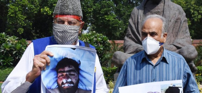 In parliament, NC leaders protest against “fake encounters and custodial killings” In parliament, NC leaders protest against “fake encounters and custodial killings”