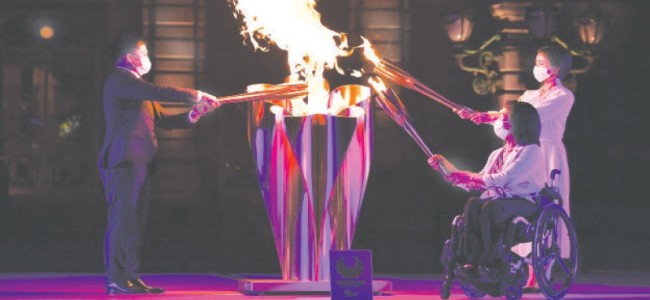 Paralympic flame in Tokyo as virus surges days before opening Paralympic flame in Tokyo as virus surges days before opening