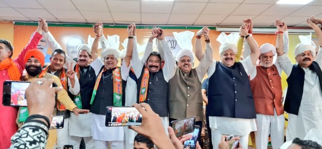 Two former NC legislators among dozen leaders join BJP in Jammu Two former NC legislators among dozen leaders join BJP in Jammu