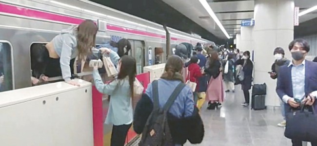 Man with knife injures 17 passengers on Tokyo train