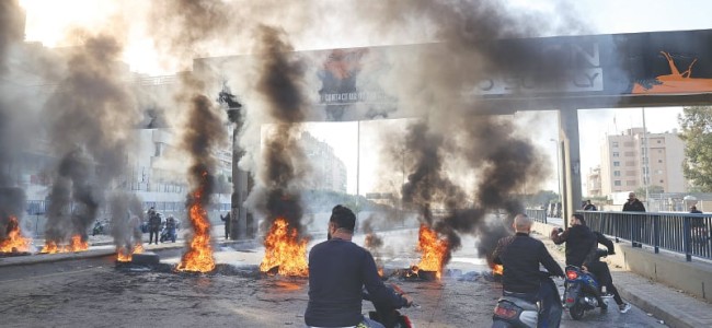 Lebanese protesters block roads over economic misery Lebanese protesters block roads over economic misery