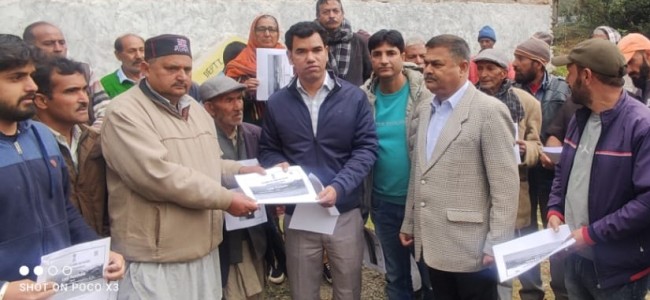 Comm Secy tours Doda; Distributes land pass books, inspects Revenue camps Comm Secy tours Doda; Distributes land pass books, inspects Revenue camps