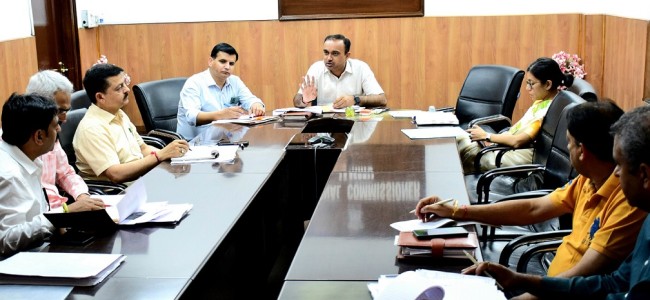 Div Com Jammu reviews land issues of Industries department