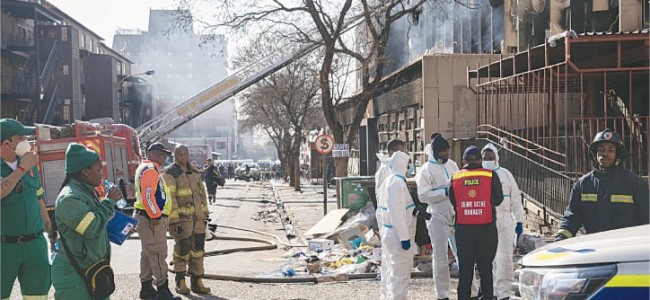 Fire in illegal housing block kills 74 in South Africa