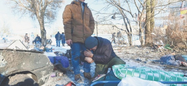 Strike on busy market kills 25 in eastern Ukraine Strike on busy market kills 25 in eastern Ukraine