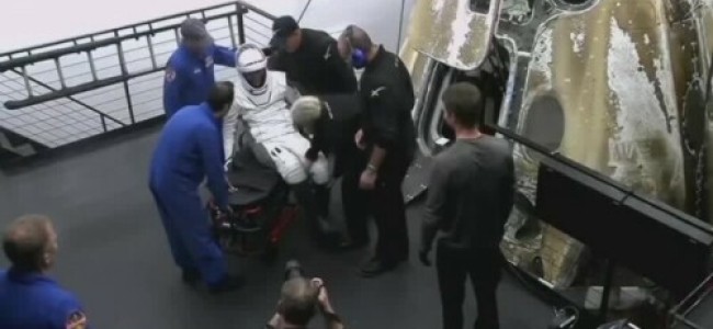 Nasa astronaut hospitalised on return from ISS after eight months Nasa astronaut hospitalised on return from ISS after eight months